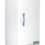 A tall, white 26 cu. ft. solid door pharmacy refrigerator labeled Med Fridge stands on four wheels. The digital display is on top, a handle is in the center, and ventilation grilles and an eco-friendly sticker are near the base. The logo American BioTech Supply is visible.