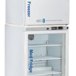 A tall, white medical refrigerator and freezer unit with glass door on the fridge section showing empty shelves. Blue text reads “Med Freezer” on top and “Med Fridge” on the bottom. Branding says “ABS American BioTech Supply.” Digital displays are above each section.