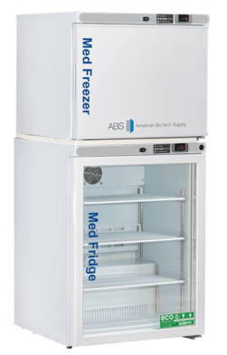 A tall, white medical refrigerator and freezer unit with glass door on the fridge section showing empty shelves. Blue text reads “Med Freezer” on top and “Med Fridge” on the bottom. Branding says “ABS American BioTech Supply.” Digital displays are above each section.