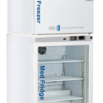 A white medical freezer sits atop a matching medical fridge with a glass door. Both are labeled “Med Freezer” and “Med Fridge” in blue. Shelves inside the fridge are empty. Logos for American BioTech Supply and eco-friendly features are visible.