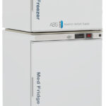 A white, two-door medical refrigerator and freezer unit labeled Med Fridge on the lower part and Med Freezer on the upper part. Both doors have digital displays and locks. The unit displays the ABS American BioTech Supply logo and an eco-friendly sticker.
