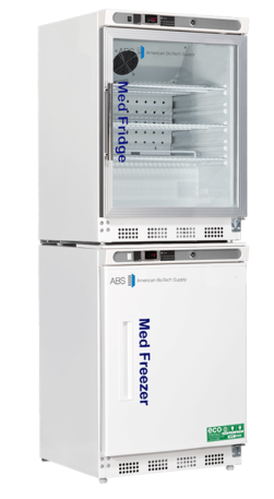 A white double-door unit with a glass-fronted top fridge labeled “Med Fridge” and a solid-door bottom freezer labeled “Med Freezer.” Both have digital displays and vents, and the unit is branded “American Biotech Supply.” Shelves are visible inside the fridge.