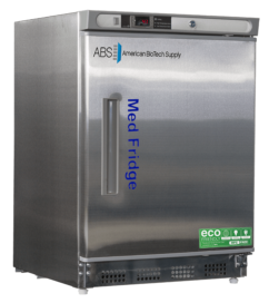 A 4.6 cu. ft. stainless steel pharmacy refrigerator built-in by American BioTech Supply with a digital display on top, labeled Med Fridge in blue text. Eco-friendly and refrigerant info stickers are on the bottom right. The fridge has a single door and a vertical handle.