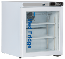 A white 1 Cu. Ft. Pharmacy Countertop Freestanding Refrigerator with a glass door, digital temperature display showing 4.1°C, and two wire shelves. The words Med Fridge and American BioTech Supply are printed on the door. A fan is visible inside at the back.