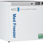A 1.7 cu. ft. Premier Pharmacy Laboratory Freezer, labeled “Med Freezer” in blue on the side and “American BioTech Supply” on the front, features a control panel and digital display, plus eco-friendly and HFC free labels on the bottom right.