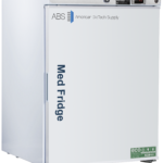 A white 5.2 cu. ft. undercounter pharmacy refrigerator with Med Fridge in blue text on the door, and American BioTech Supply logo at the top. A digital temperature display reads 4.1°C. An eco-friendly label is on the bottom right corner of the door.