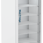 Tall, white medical refrigerator with a glass front door, labeled Med Fridge in blue text. Inside, there are several adjustable metal shelves. The control panel and digital temperature display are visible at the top right corner of the fridge.