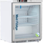 A white ADA-compliant medical vaccine refrigerator with a glass door that is right hinged and labeled “Med Fridge” and “American BioTech Supply.” It has three adjustable shelves inside and a digital temperature display on top. An NSF/ANSI 456 compliant certification sticker is on the lower right corner of the door.