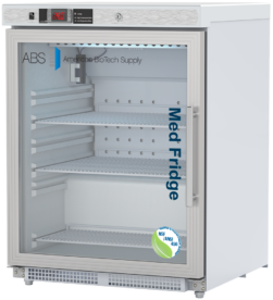 A white medical ADA-compliant refrigerator with a glass door showing three adjustable shelves inside. The door displays the words Med Fridge and American BioTech Supply. A digital control panel is at the top, and an NSF/ANSI 456 certification sticker is on the bottom right of this left hinged door model.