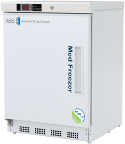 A white, compact medical vaccine freezer by American BioTech Supply with a digital temperature display showing -20.0°C. The door reads Med Freezer with an NSF/ANSI 456 certification logo. The handle is vertical on the left side, and ventilation grilles are at the bottom.