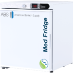 A compact white medical vaccine refrigerator, left hinged, with a digital temperature display reading 4.0°C. The door says “Med Fridge” and “ABS American BioTech Supply,” with an NSF/ANSI 456 certification badge on the lower corner.