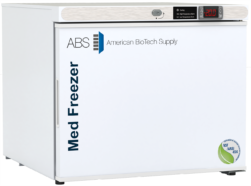 A white solid door vaccine medical freezer labeled Med Freezer and American BioTech Supply with a digital display showing -20°C. There’s a circular green and blue NSF/ANSI 456 certification mark on the lower right corner of the door.