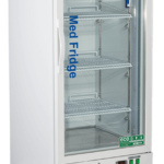 A tall, white medical refrigerator with a glass door, metal shelves, and “Med Fridge” printed on the door. The top label reads “American BioTech Supply.” The lower front has a vent, a control panel, and an eco-friendly sticker.